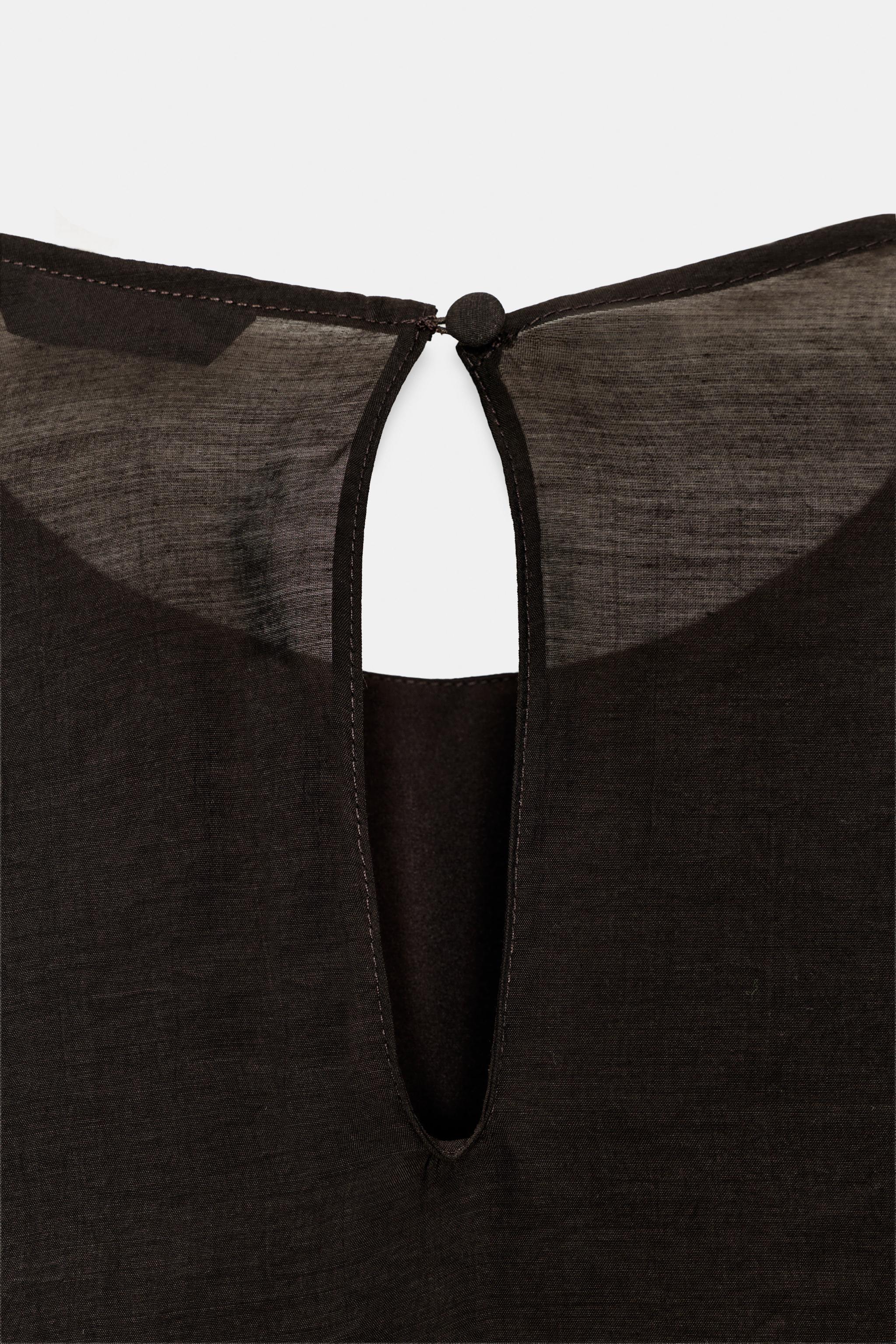 ASYMMETRIC RUFFLED TOP